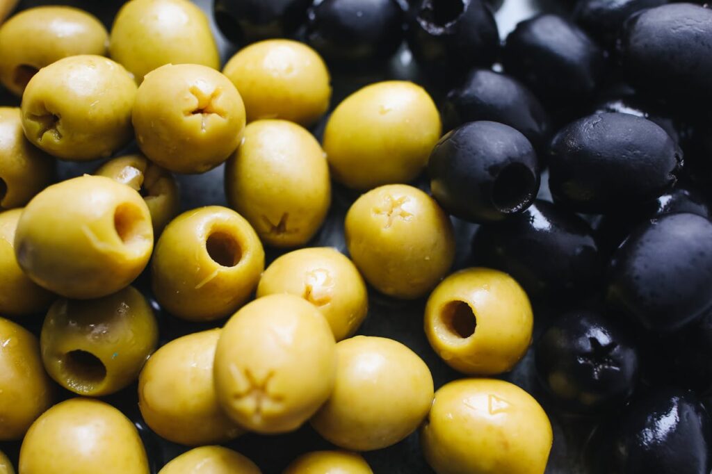 A close shot of variety of olives, a flavorful zero-carb snacks, great for diabetics.