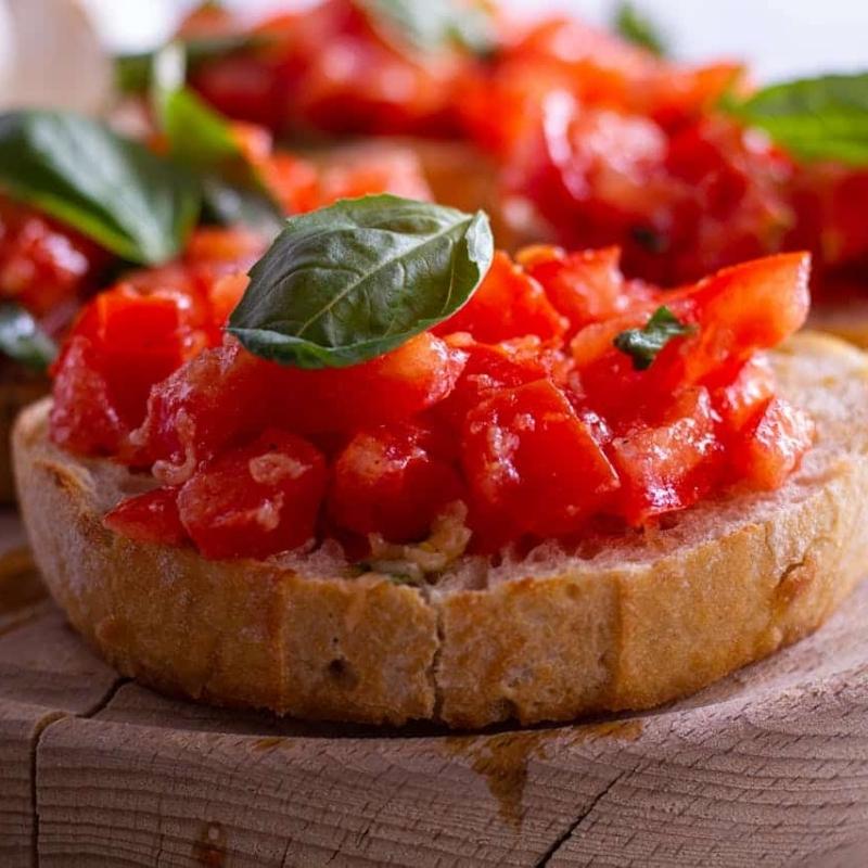 Classic bruschetta with tomato and basil, a perfect appetizer for Christmas Day.